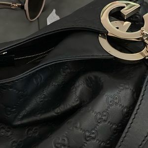 Authentic Gucci signature GG Black leather shoulder bag